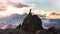 Adventure Man on top of Rocky Mountain Cliff. Aerial Canadian Mountain landscape from BC