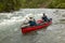 Adventure river rapid canoeing in remote Alaska