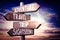 Adventure, travel, trip, sightseeing - wooden signpost, roadsign with four arrows