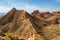 Adventure traveler enjoy masterpieces of nature in Danxia Geopark, Zhangye, Gansu, China