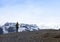 Adventure woman by glacier nature on Iceland. Tourist in Iceland