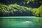 Adventurer Kayaking at the Tranquil Lake Alone