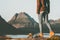 Adventurer woman feet hiking in Norway mountains landscape Travel Lifestyle concept active weekend vacations