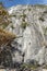 Adventurers climbing on large rocks in a national park