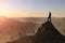 Adventurous Adult Man hiking on top of a mountain.