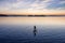 Adventurous Caucasian Adult Woman on a Stand Up Paddle Board