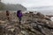 Adventurous girl hiking Juan de Fuca Trail
