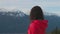 Adventurous Girl Hiking in the mountains during a sunny Winter Sunset.