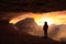 Adventurous Girl Looking out at a dramatic American Mountain Landscape