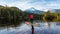 Adventurous Girl Paddle Boarding on Levette Lak