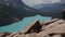 Adventurous Hiker Overlooking Turquoise Mountain Lake Panorama