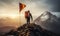 Adventurous mountaineer with an orange backpack reaching the summit with a red flag on top against a dramatic sky at sunrise