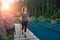 Adventurous White Caucasin Adult Woman Hiking on a trail in Canadian Nature