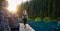 Adventurous White Caucasin Adult Woman Hiking on a trail in Canadian Nature