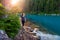 Adventurous White Caucasin Adult Woman Hiking on a trail in Canadian Nature