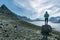 Adventurous woman overlooks Alftafjordur fjord, Westfjords, Iceland