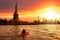 Adventurous Woman Sea Kayaking near the Statue of Liberty