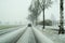 Adverse dangerous road conditions on a highway in winter during heavy snowfall