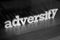 Adversity, text words typography written with wooden letter on black background, life and business negativity