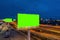 Advertising billboard green screen at night