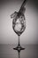Advertising glass and drinks on a light background. Champagne glass, wine glass