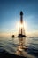 Adzhyholskyy mayak or Adziogol lighthouse in Dnieper estuary, Ukraine. Scenic sunset landscape