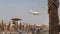 An Aegean Airlines AIrbus airplane above McKenzie beach just before landing at Larnaca International Airport