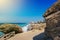 Aegean beach with sunshades in city of Rhodes Rhodes, Greece