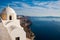 Aegean sea and the Catholic Church of St. Stylianos in the city of Fira in Santorini Island