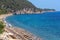 Aegean sea coast with beach Greece.