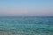 Aegean seascape: turquoise blue sea and rocky beach