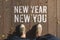 Aerail view of New year new you word on wooden plank floor with