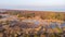 An aerail view of the Studland Nature Reserve with sand dune, peat bog and sea under a majestic hazy blue sky