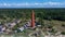Aereal Dron Shot Akmenrags Lighthouse on the Latvian Coast of the Baltic Sea