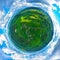 Aerial 360 panoramic tiny planet view on sudety mountains with touristic city in the valley surrounded by meadows, forest and