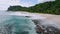 Aerial 4K drone footage of tropical beach and white ocean waves at Mahe island, Seychelles