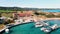 Aerial 4k fisherman pier with hotel in Karpaz Golden Beach, North Cyprus