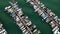 Aerial 4k footage of the boats parked at Tamsui Fisherman\'s Wharf Harbor in Taiwan.