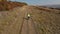 Aerial 4k view of a cyclist riding bike in the outdoors by drone