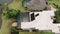 Aerial Above view of screened in pool and lanai in florida house. Drone shot