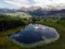 Aerial alpine mountain lake Schwendisee panorama in Wildhaus Unterwasser Toggenburg St Gallen Switzerland alps Europe