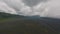 Aerial altitude panorama view volcanic black sand lava field at wild mountain