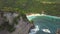 Aerial: Amazing Atuh Beach in Nusa Penida, Indonesia. Drone Fly Over Small Wooden House on the Cliff. 4K.
