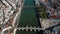 Aerial. Ancient Roman bridge over the river Gilao, the village of Tavira.