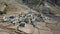 Aerial approaching shot of a Small Secluded Himalayan Village in Mudh Village , Spiti , Himachal