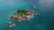 Aerial arc shot around small oasis desert island St. Pierre, Praslin