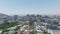 Aerial ascending shot of buildings in city. Panoramic shot of multistorey structures in city centre. Cape Town, South