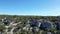 Aerial Ascent: Drone Reveals Panoramic Horizon View behind Rocky Cliffs and Verdant Hills in Gordes, Vaucluse, PACA