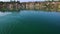 Aerial: athlete rowing in a kayak