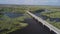 Aerial auto road bridge over Desna river in Chernihiv region at summer, Ukraine